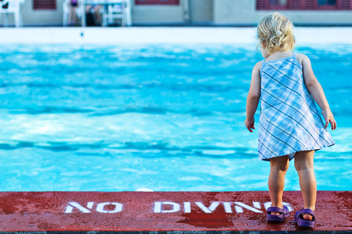 What are some commonly posted swimming pool rules?