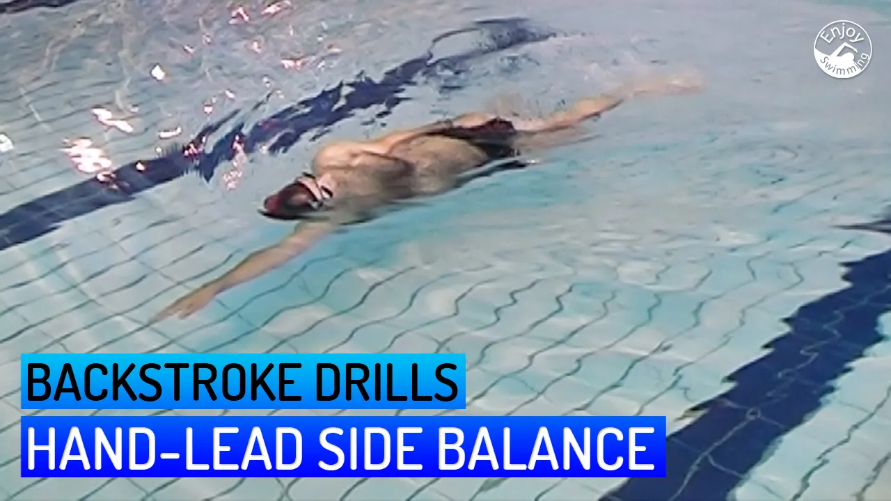 A novice swimmer who practices the hand-lead side balance drill for the backstroke.
