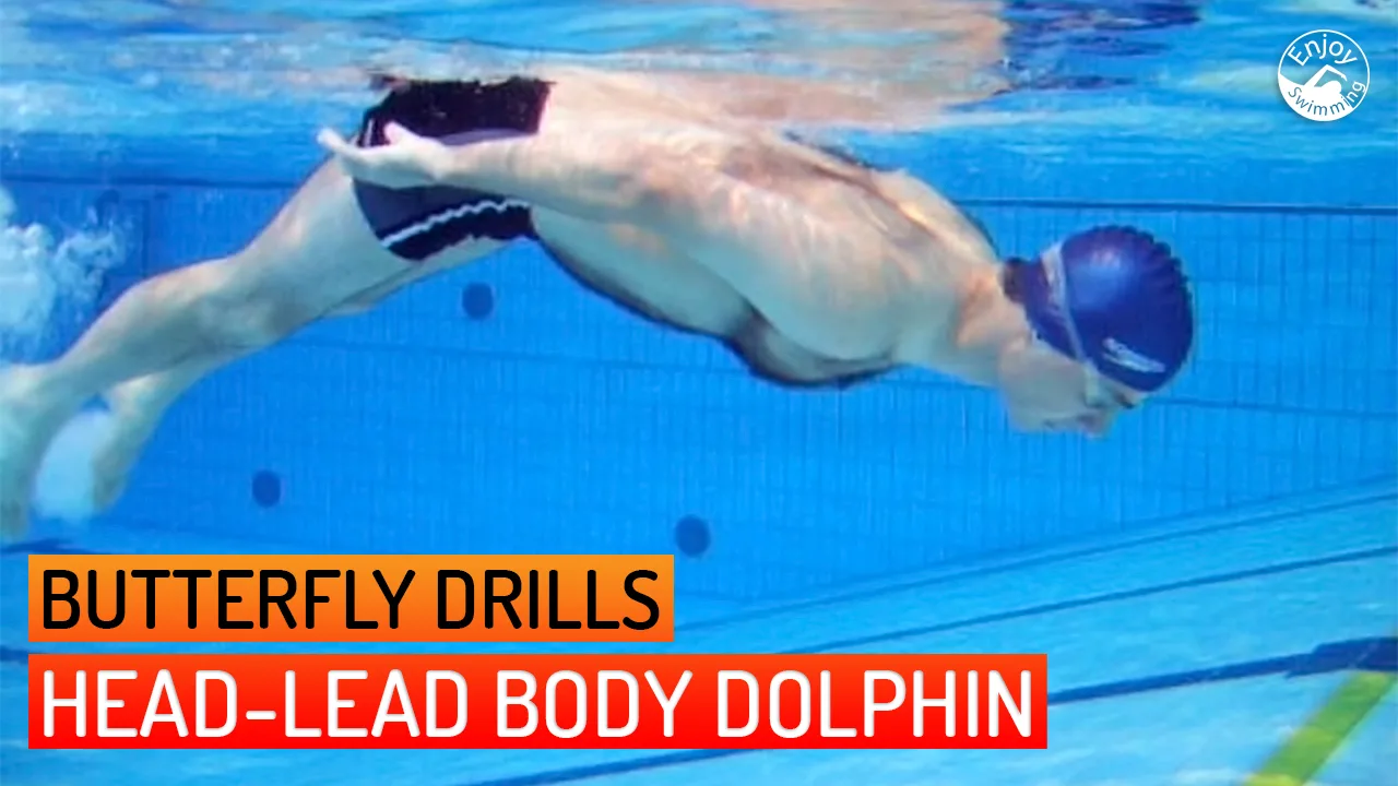 A swimmer practicing the Head-Lead Body Dolphin drill for the butterfly stroke.