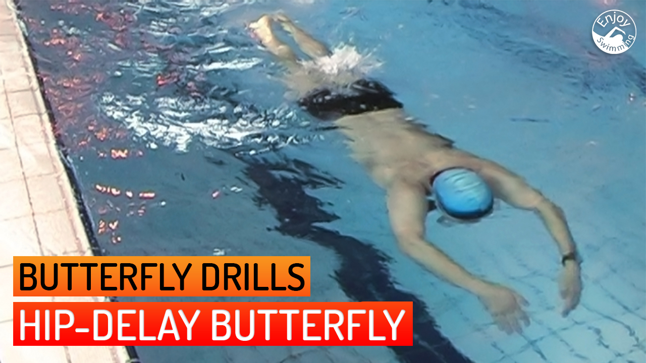 A swimmer practicing the Hip-Delay Butterfly drill for the butterfly stroke.