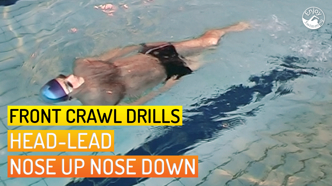 A swimmer practicing the Head-Lead Nose Up/Nose Down drill for the front crawl stroke.