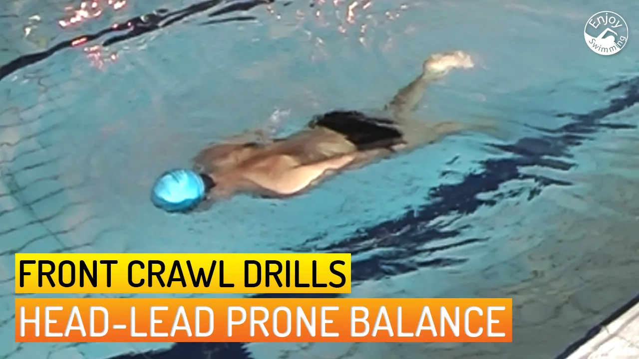 A novice swimmer who practices the head-lead prone balance drill for the front crawl stroke.