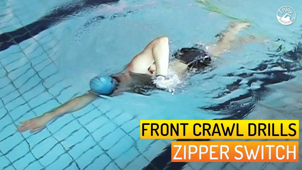 A novice swimmer who practices the zipper drill for the front crawl stroke.