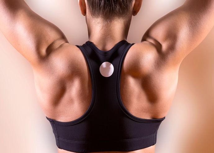 Shot of the muscular upper back of a woman