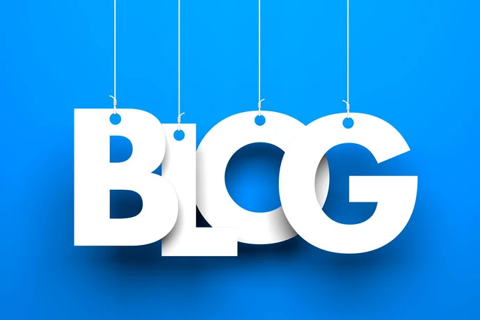 Cut out white letters of the word "blog" on a blue background