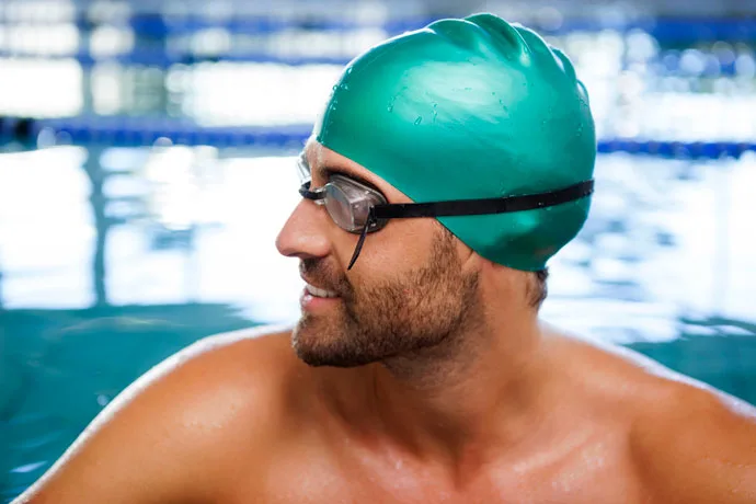 Man wearing a silicone swim cap